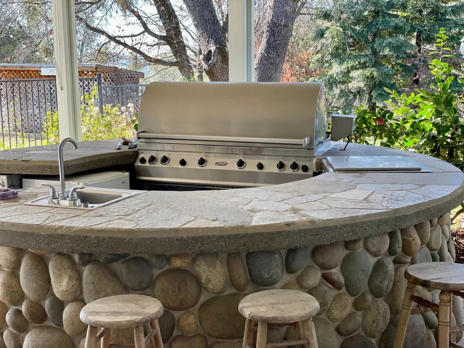 Outdoor stone BBQ kitchen